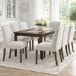 Compton grey chairs around a dark wooden dining table