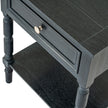 Close-up of the drawer knob and turned leg