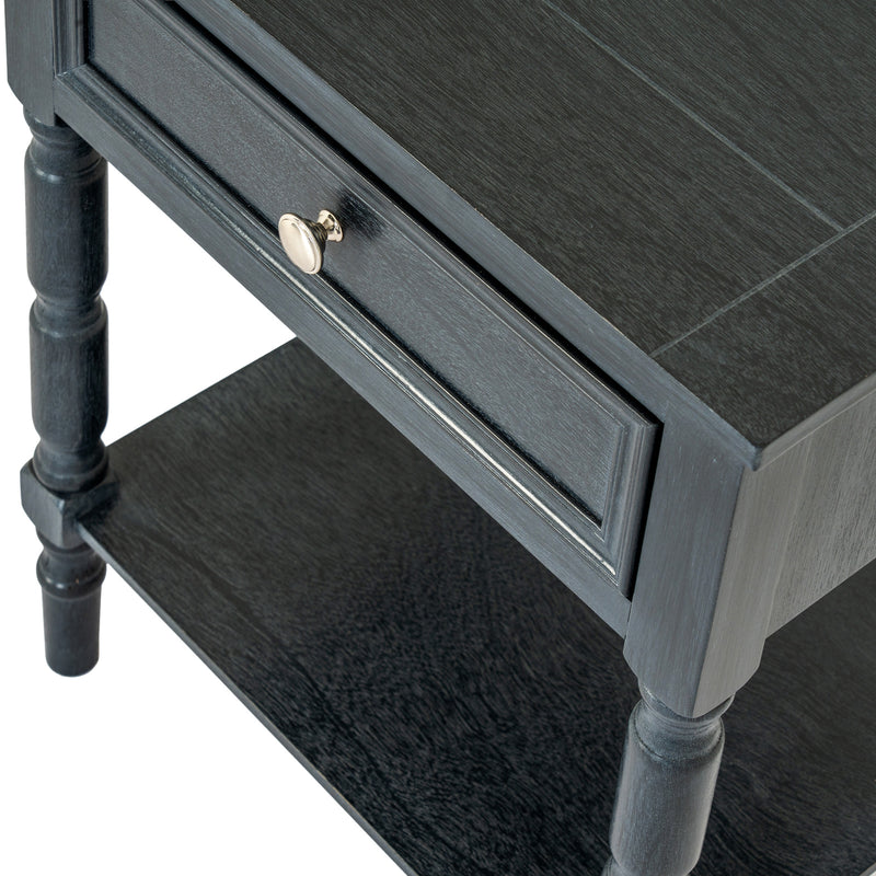 Close-up of the drawer knob and turned leg
