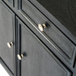close-up of the brass-tone knobs