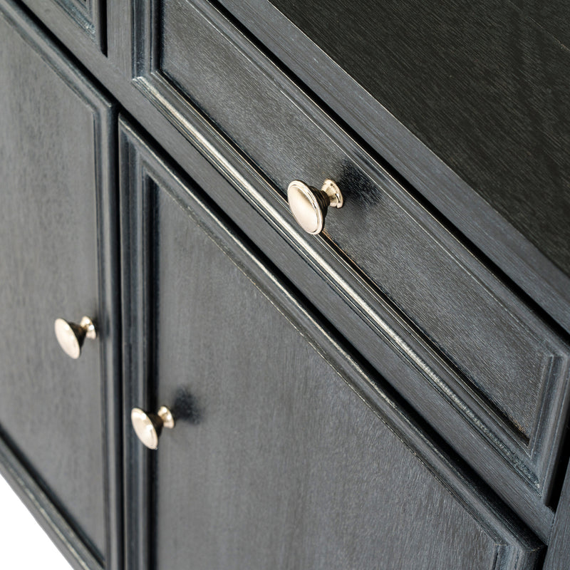close-up of the brass-tone knobs