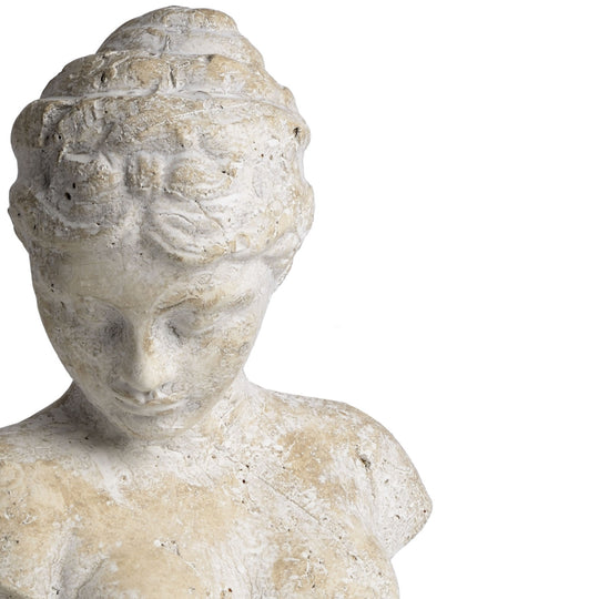 Woman's head bust seen from a three-quarter angle