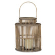 Cylinder wicker lantern with a candle in its glass holder