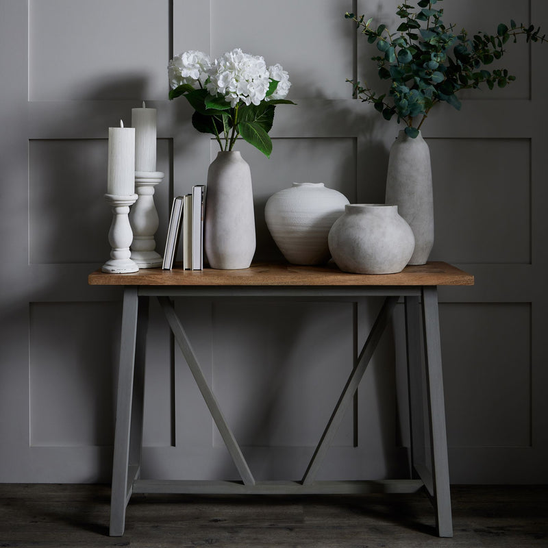 Darcy Ople vase on a console with other vases and candles sold separately