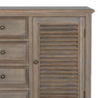 Close-up of the louvred door and drawer knobs