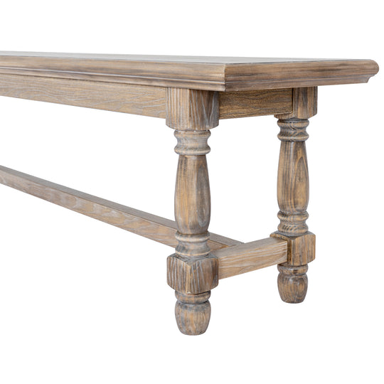 End of the bench showing the turned legs and stretcher