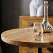 Close-up of the round wooden table top