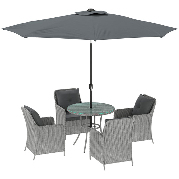 Light grey rattan dining set with four cushioned chairs, round glass table and parasol