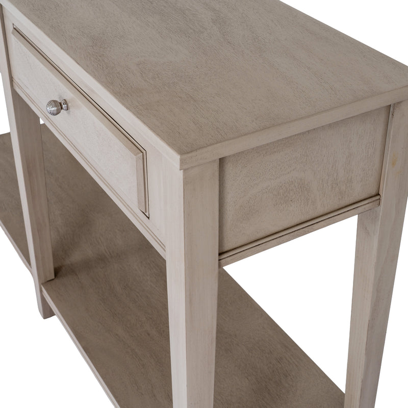 Close-up of a drawer and leg