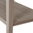 Close-up of the lower shelf and leg