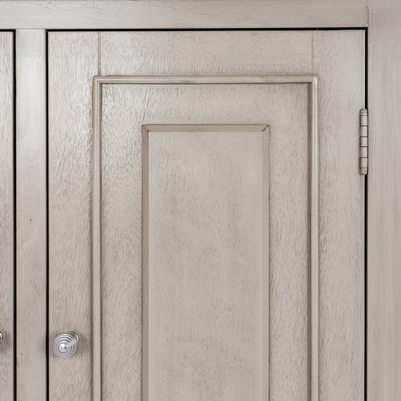 Close-up of the raised door panel and hinge