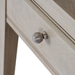 close-up of the ribbed metal drawer knob