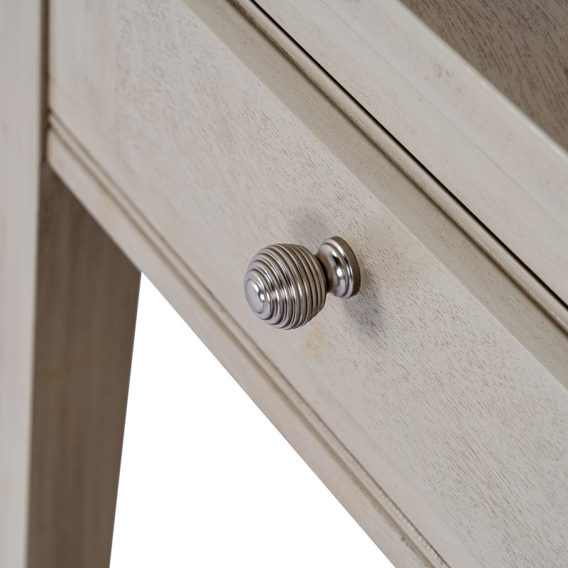 close-up of the ribbed metal drawer knob