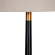 Black column with gold-tone band close-up
