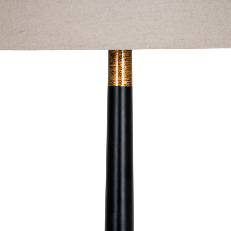 Black column with gold-tone band close-up