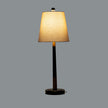 Everly table lamp switched on against a grey background