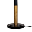 Black and gold stem meeting the round black base