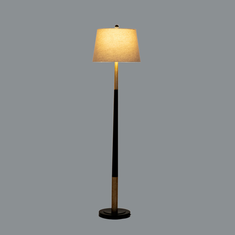 Everly floor lamp switched on against a grey background