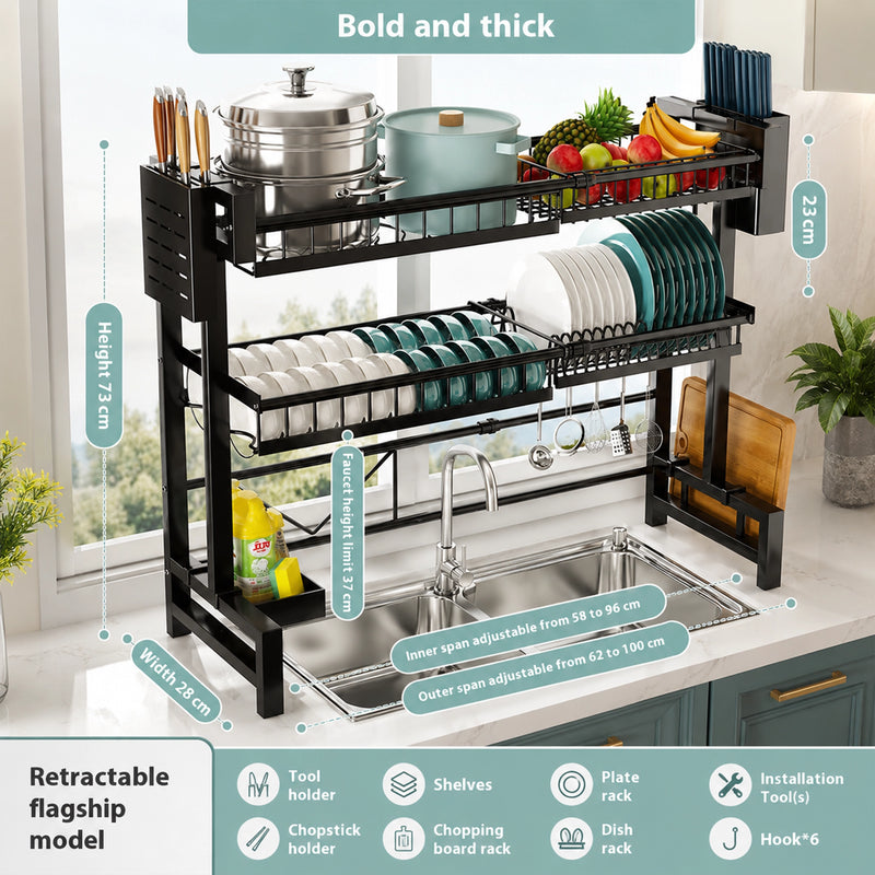 Kitchen dish rack with various utensils and dishes on a kitchen counter.