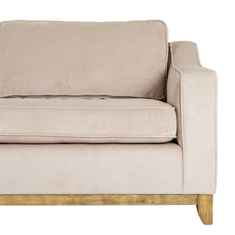 close-up of the arm, cushions and wooden plinth