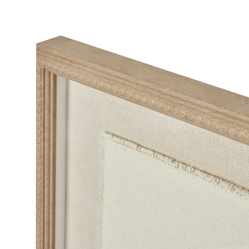 Close-up of the beaded wood frame and torn paper edge