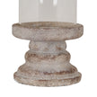 Close-up of the weathered ceramic pillar base