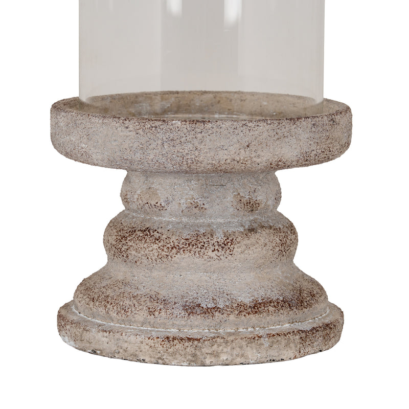 Close-up of the weathered ceramic pillar base