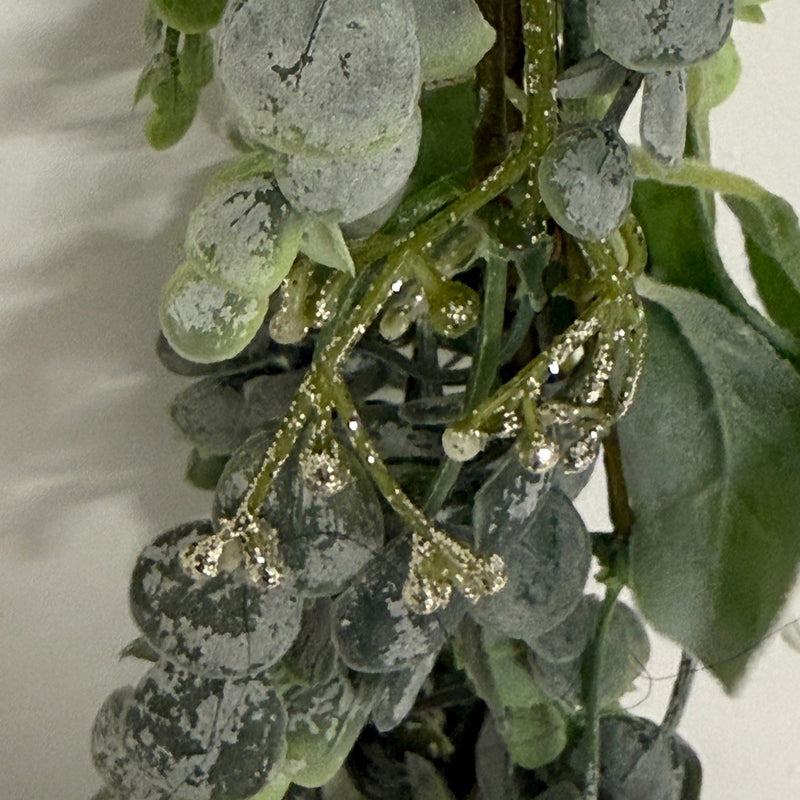 Close-up of frosted eucalyptus, lamb's ear and glittered sprigs