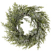 Frosted pine and eucalyptus wreath on a white background