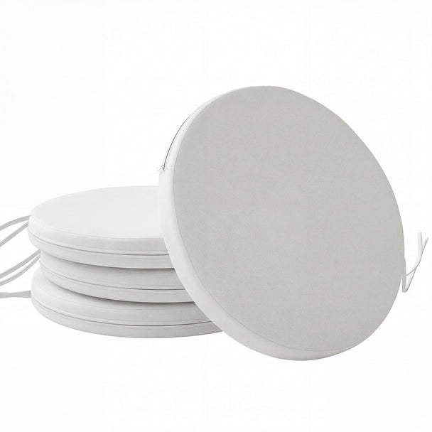 Four white round bistro chair cushions, 41 cm diameter, with ties on garden chairs