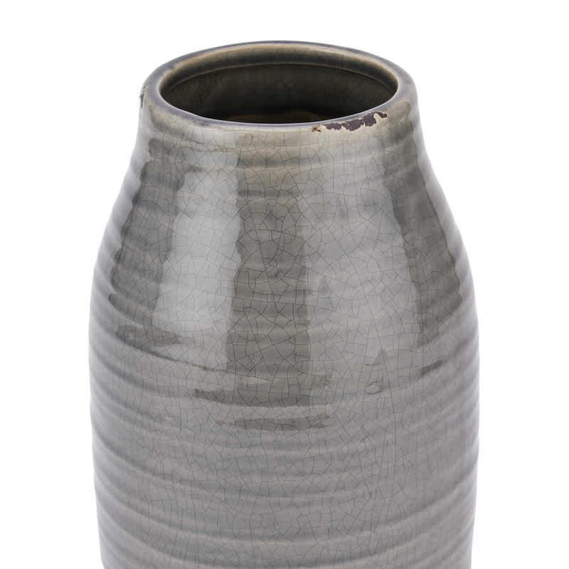 Close-up of the ribbed grey glaze and distressed rim
