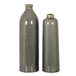 Gisela vase shown with a shorter bottle vase, sold separately