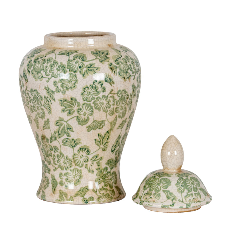 Green Clover ginger jar with lid set beside it