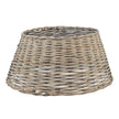 Round grey-washed wicker Christmas tree skirt on white