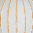 Close-up of the textured off-white finish and sandy ribs
