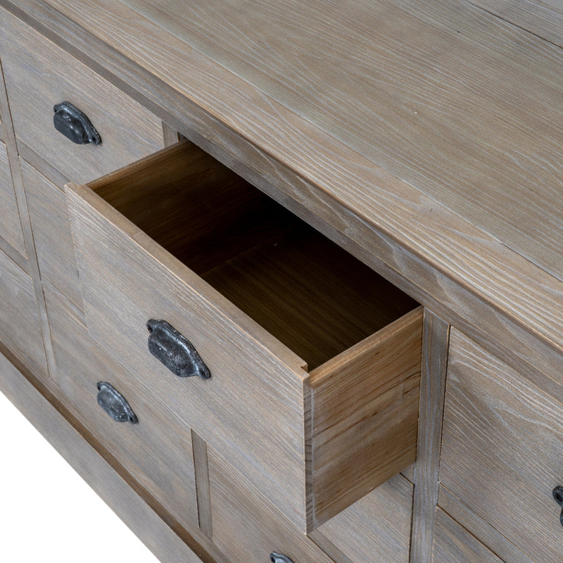 close-up of an open drawer and cup handle