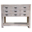 Haldon nine-drawer chest with open lower shelf on white