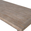 Close-up of the weathered wood grain on the table top