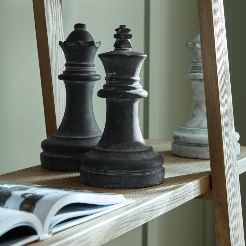 Chess pieces on a Haldon shelf, accessories sold separately