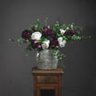 Aged Stone-Effect Ceramic Vase – 30cm, styled with flowers on a wooden stand