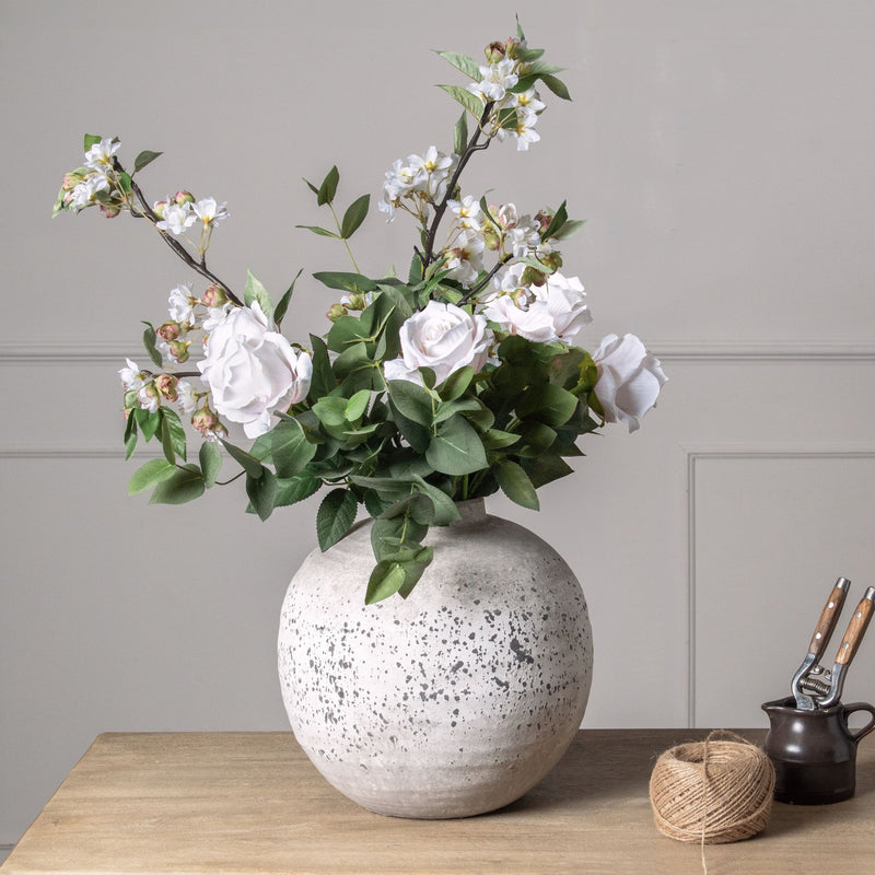 Stone-Effect Ceramic Vase – 28.5cm, styled with flowers on a wooden surface