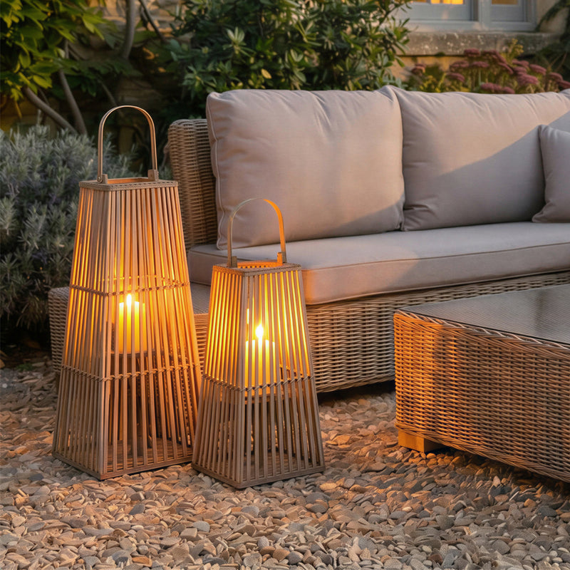 Wicker Silo Lantern with Glass Holder – 67cm, two lantern sizes in a patio setting