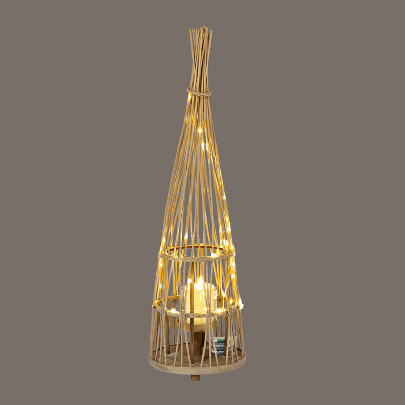 Medium Conical Wicker LED Lantern – 110cm, illuminated lantern against a dark background