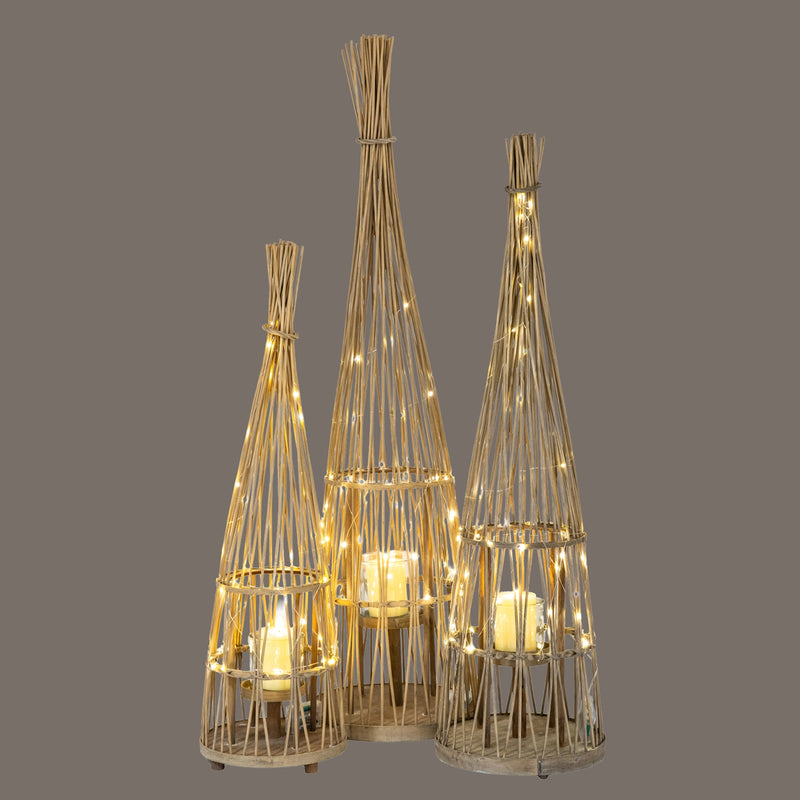 Medium Conical Wicker LED Lantern – 110cm, coordinating illuminated lanterns against a dark background