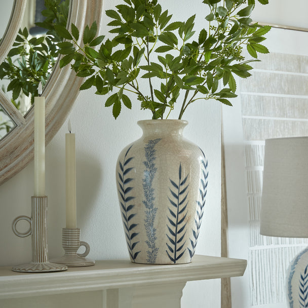 Blue & White Floral Ceramic Vase – 31cm, styled with foliage on a console