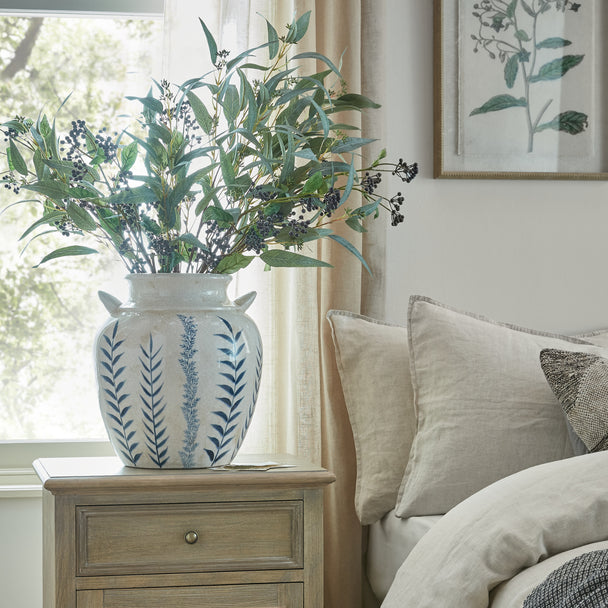 Blue & White Floral Amphora Vase – 34cm, styled with foliage in a bedroom