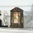 Snow globe lantern on a Christmas mantel