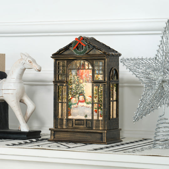 Snow globe lantern on a Christmas mantel