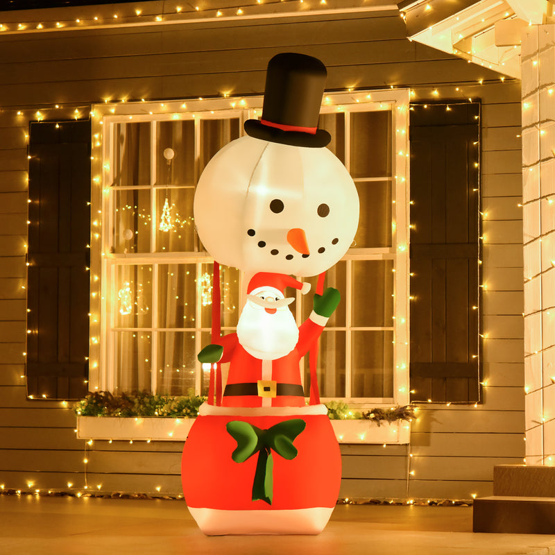 8ft Santa and Snowman Hot Air Balloon Christmas Inflatable displayed outside a decorated home