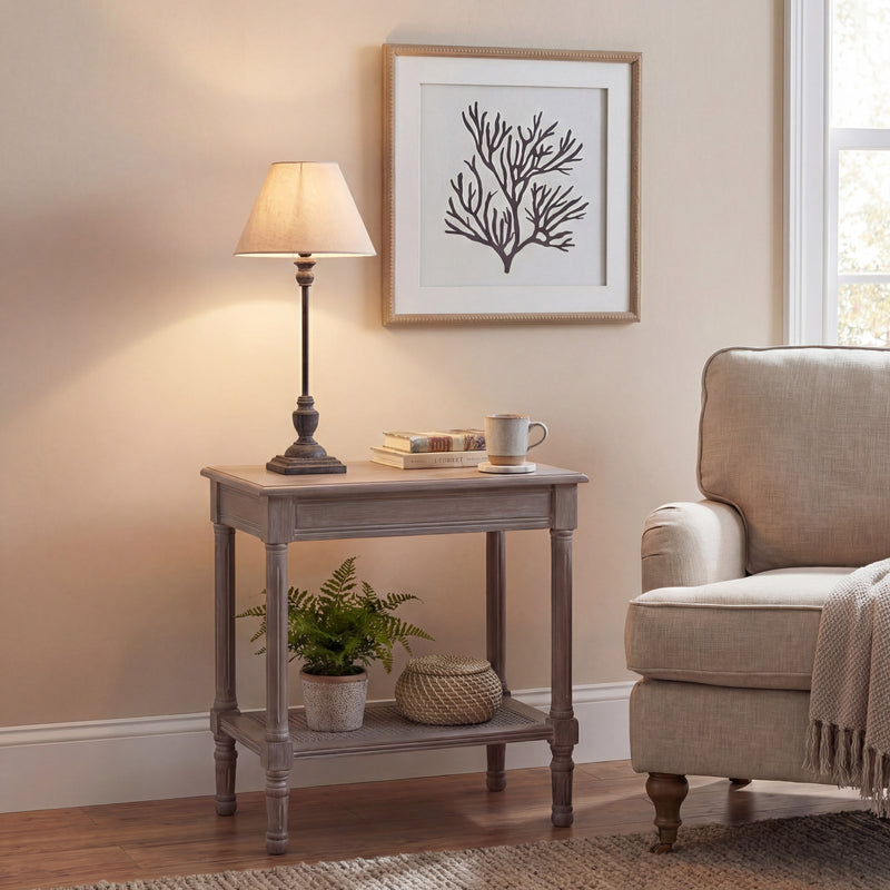 Incia lamp on a console table in a living room